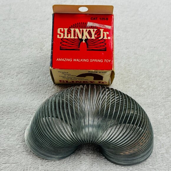 EVUC Vintage 1970's Slinky Jr. Toy by James Industries, 1 3/4" Diameter - Picture 1 of 10